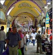 Walking through the hustle and bustle of the Turkish Bazaar in Istanbul, Turkey. Where it makes sence to haggle with the market vendours to ensure that you are not ripped off and are getting the cheapest bargains when picking up tshirts and turkish gifts and ornaments when you travel to Turkey by flights from heathrow